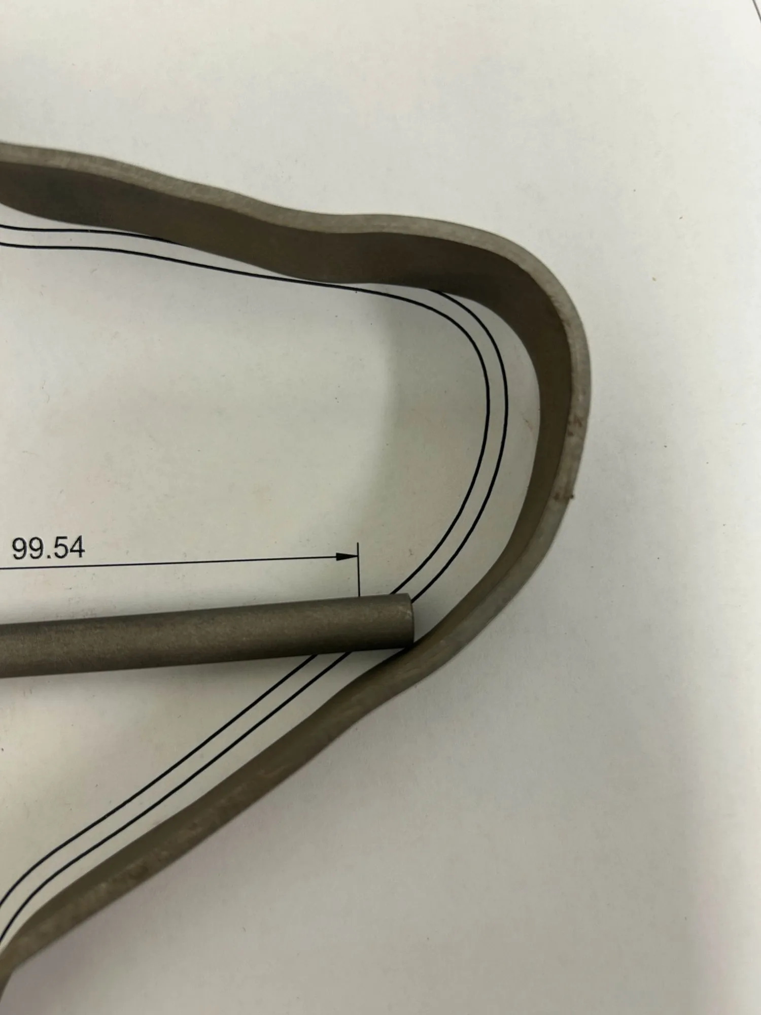 The bent steel collar frame, dimensioned against a drawing.