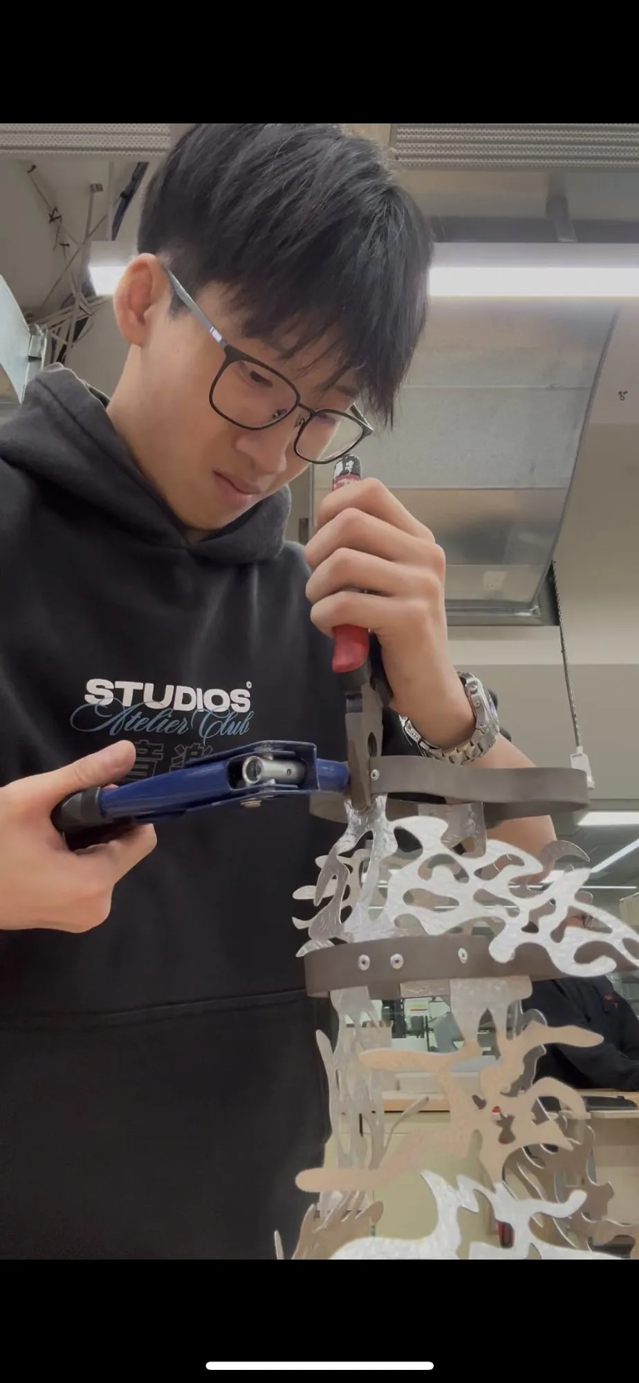 Marking and drilling rivet holes in the aluminium nets.