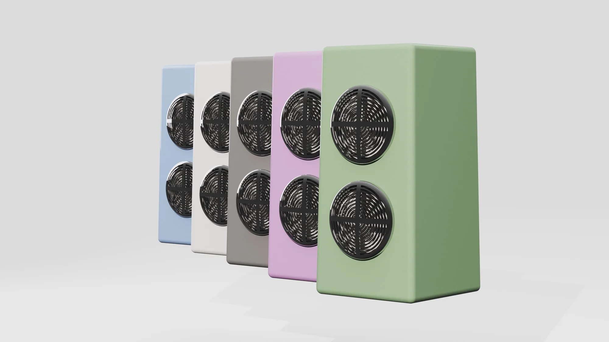 Five bluetooth speakers in a row showing the colourway range, each with two circular grilles.